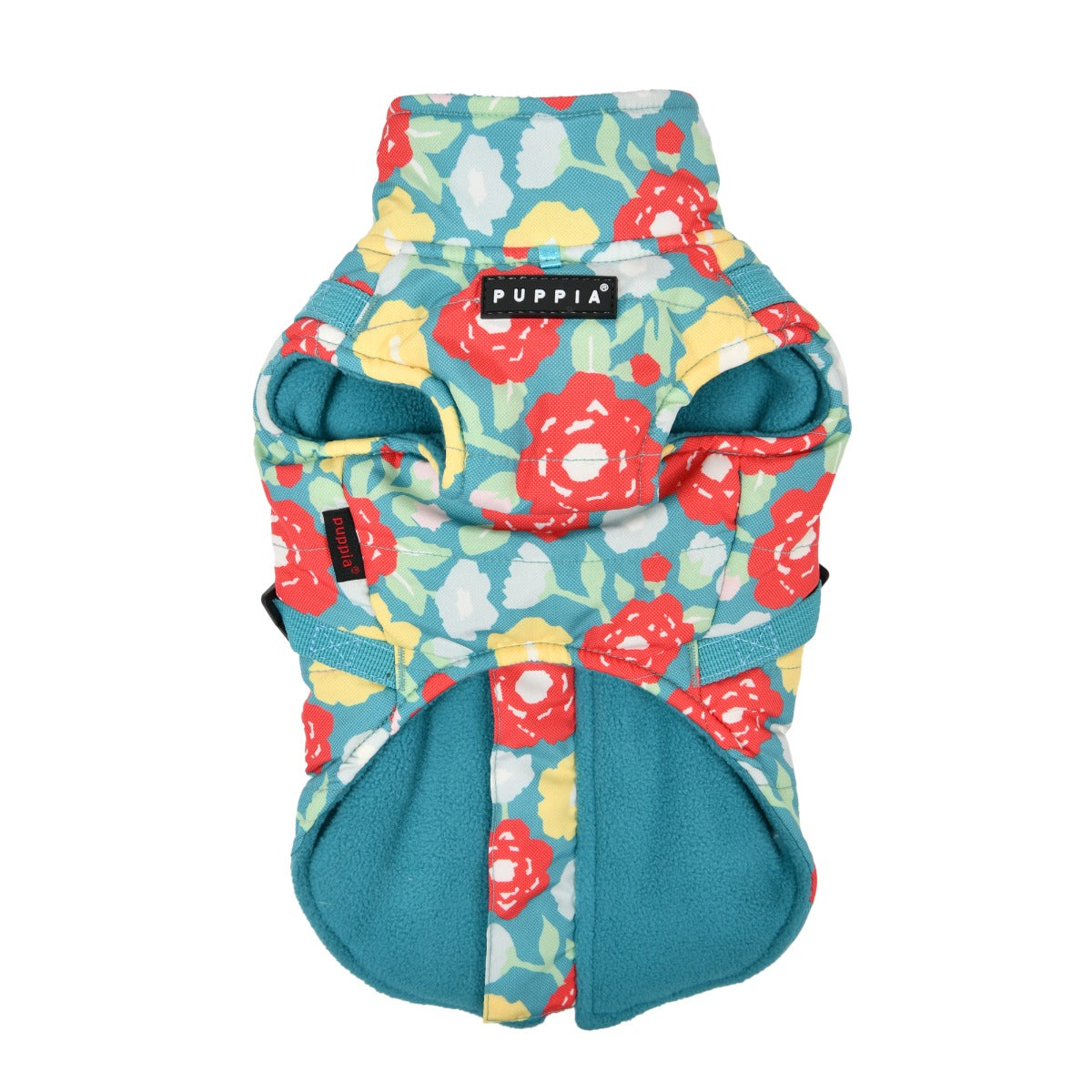 Floral-patterned dog coat with teal accents on a white background, featuring the Puppia brand.