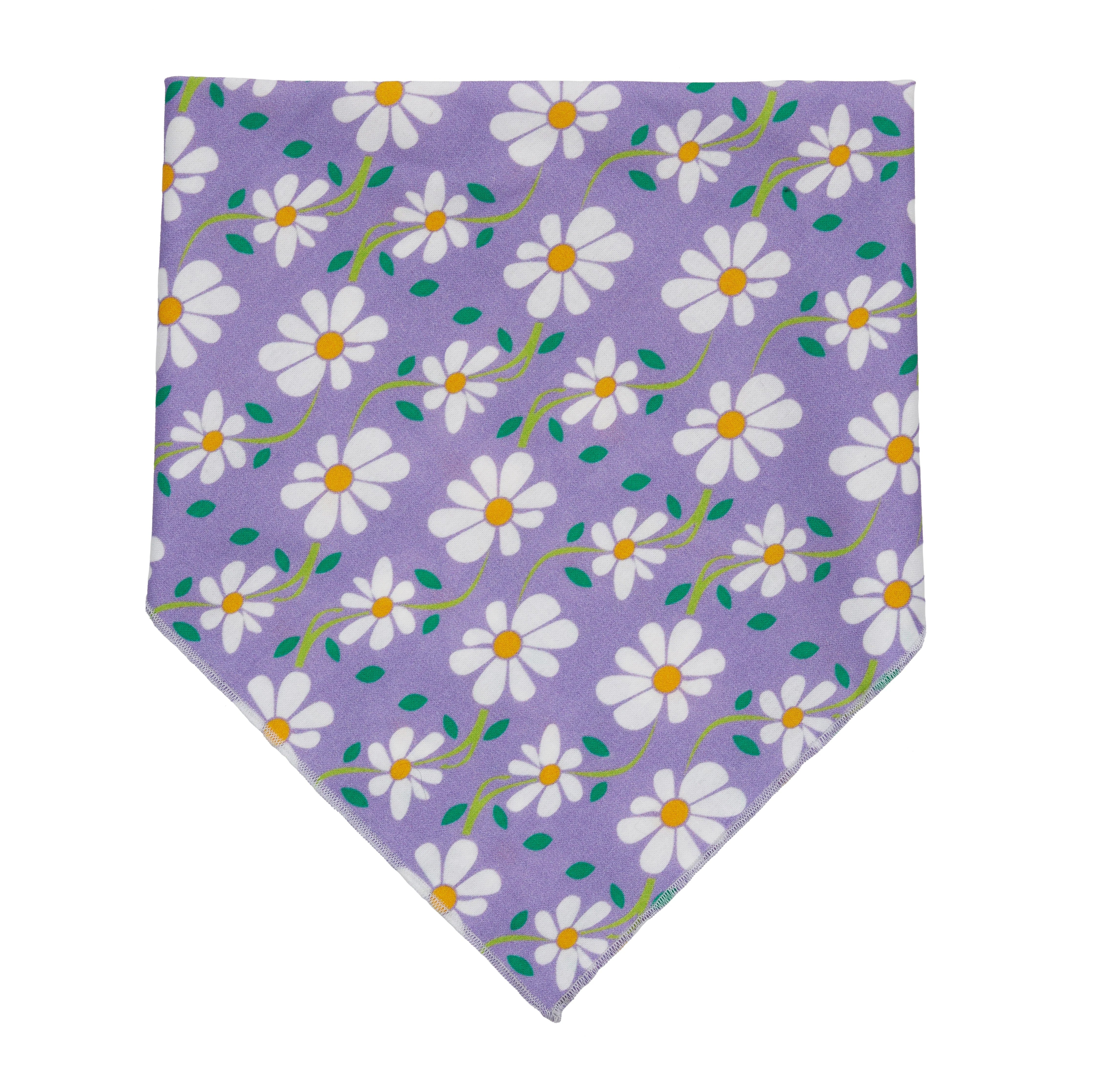 Floral patterned bandana with white flowers and green leaves on a purple background