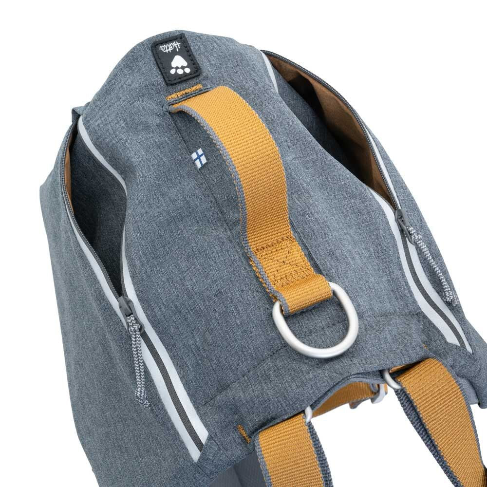 Gray harness with orange straps and a brand logo on a white background