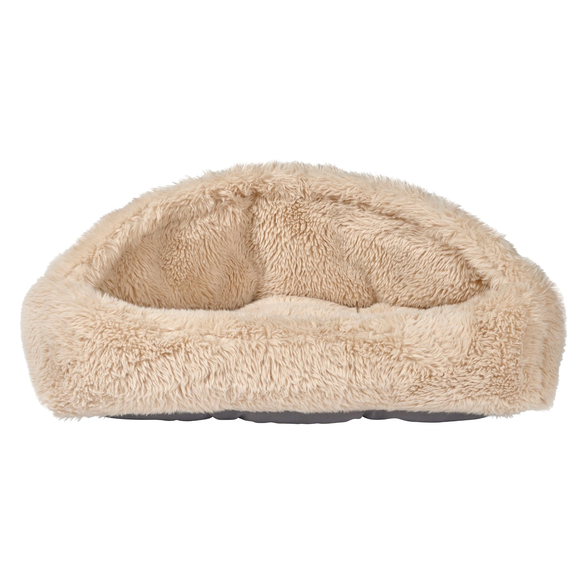 Beige fluffy pet bed on a white background