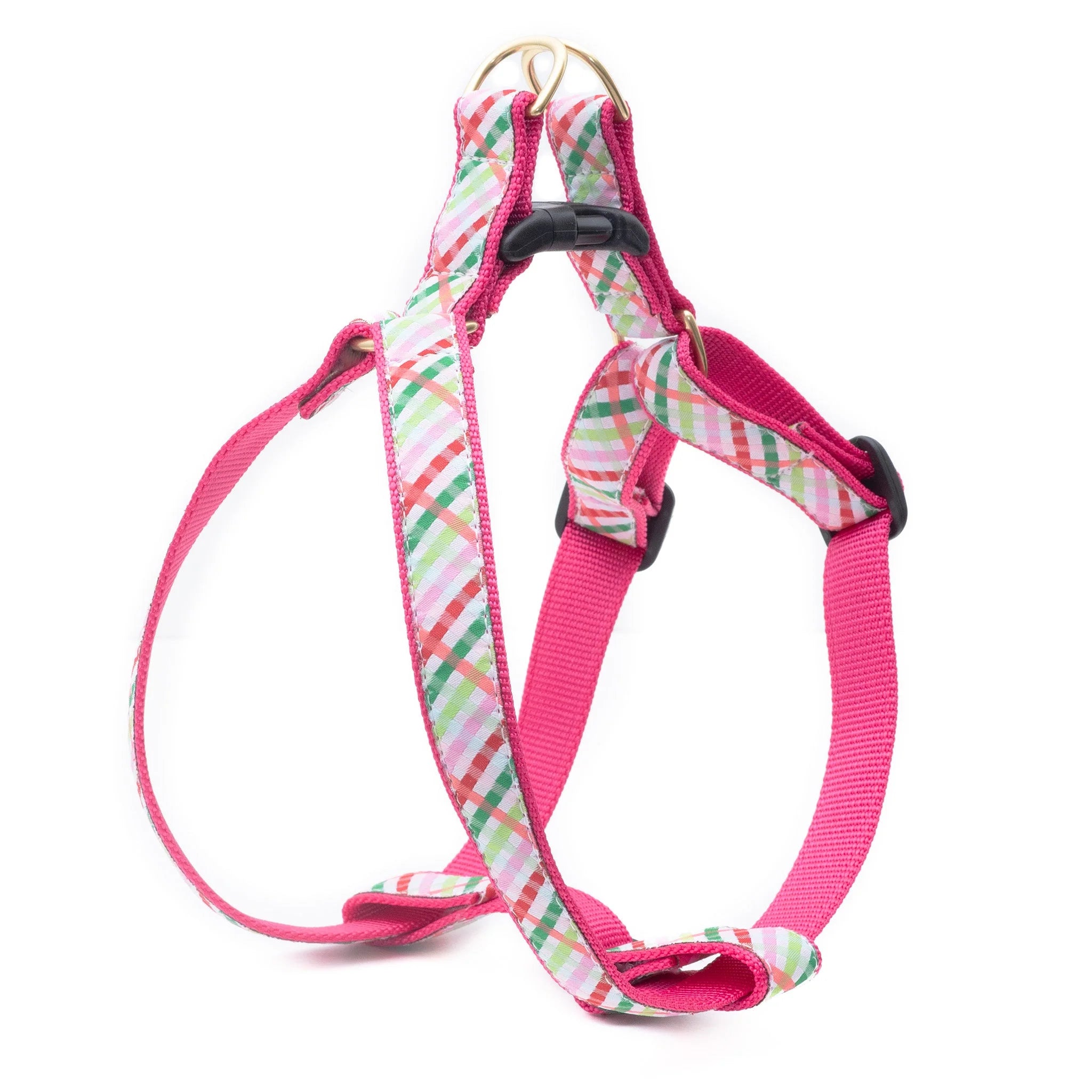 Dog harness with pink and plaid pattern on a white background