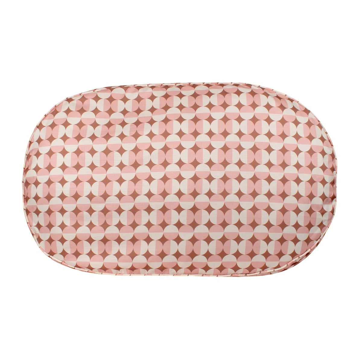 Rectangular cushion with pink and white circular pattern on a white background