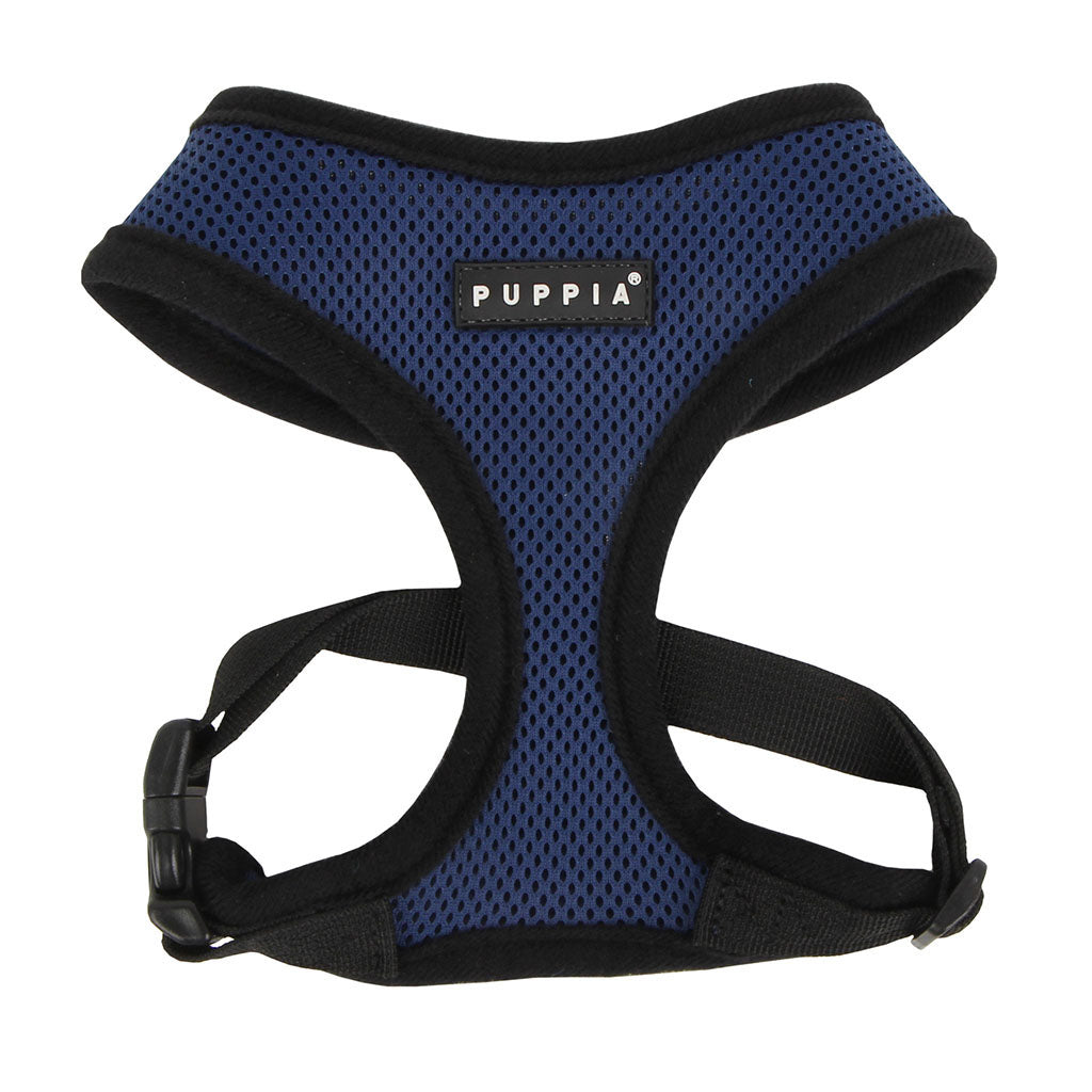 Blue dog harness with black straps on a white background, featuring the Puppia brand.