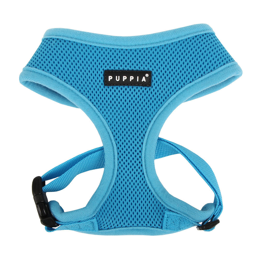 Blue dog harness with Puppia logo on a white background
