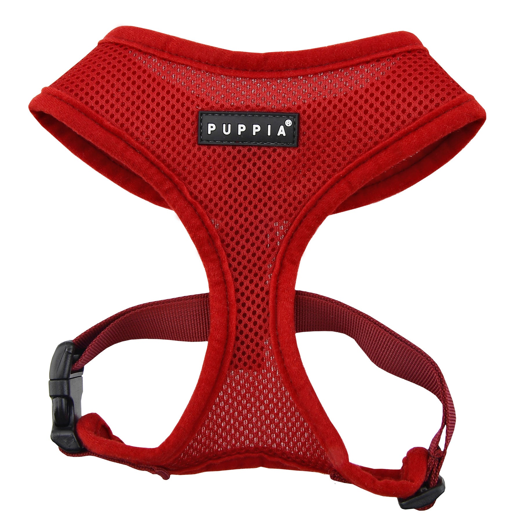 Red dog harness with Puppia label on a white background