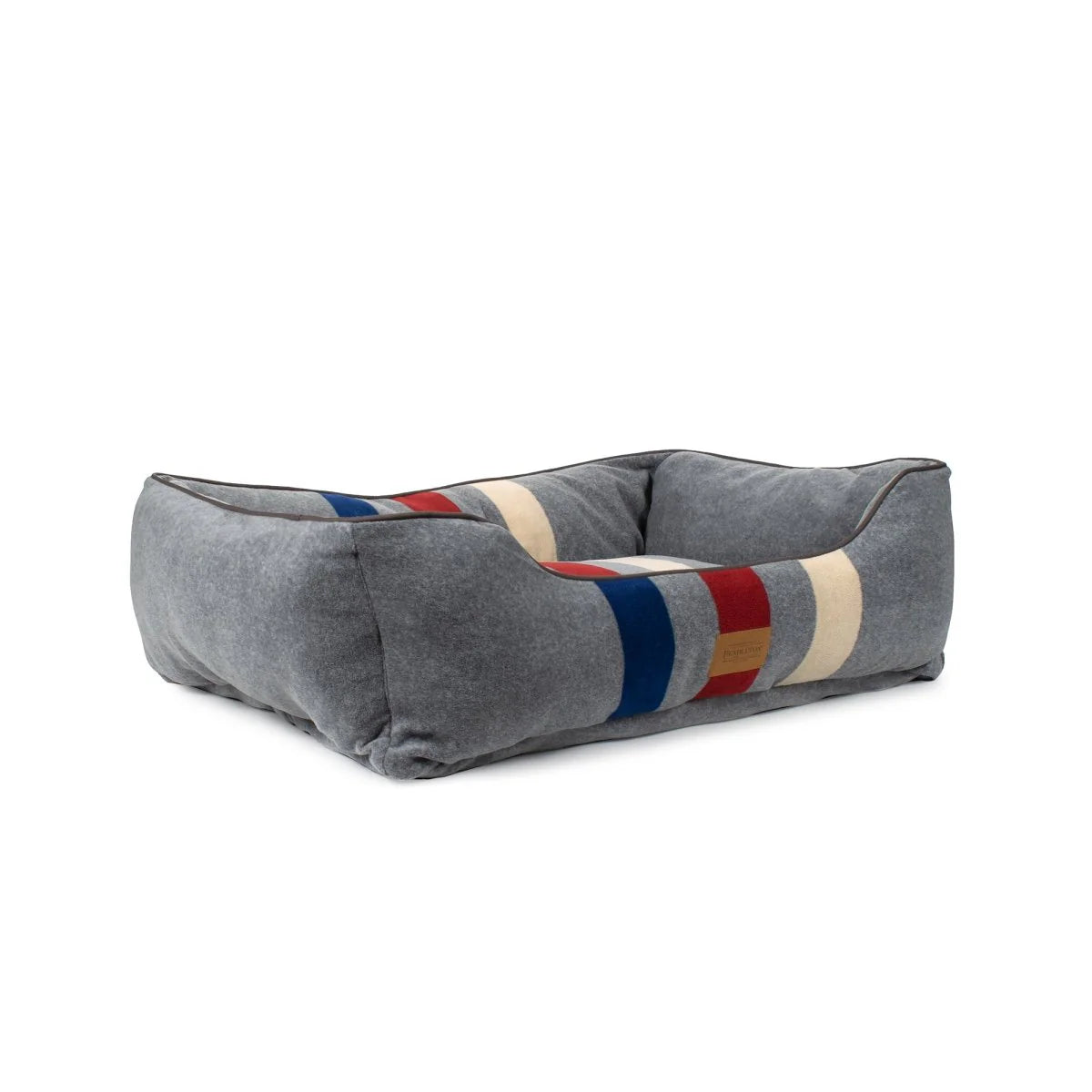 Gray pet bed with colorful striped pattern on a white background