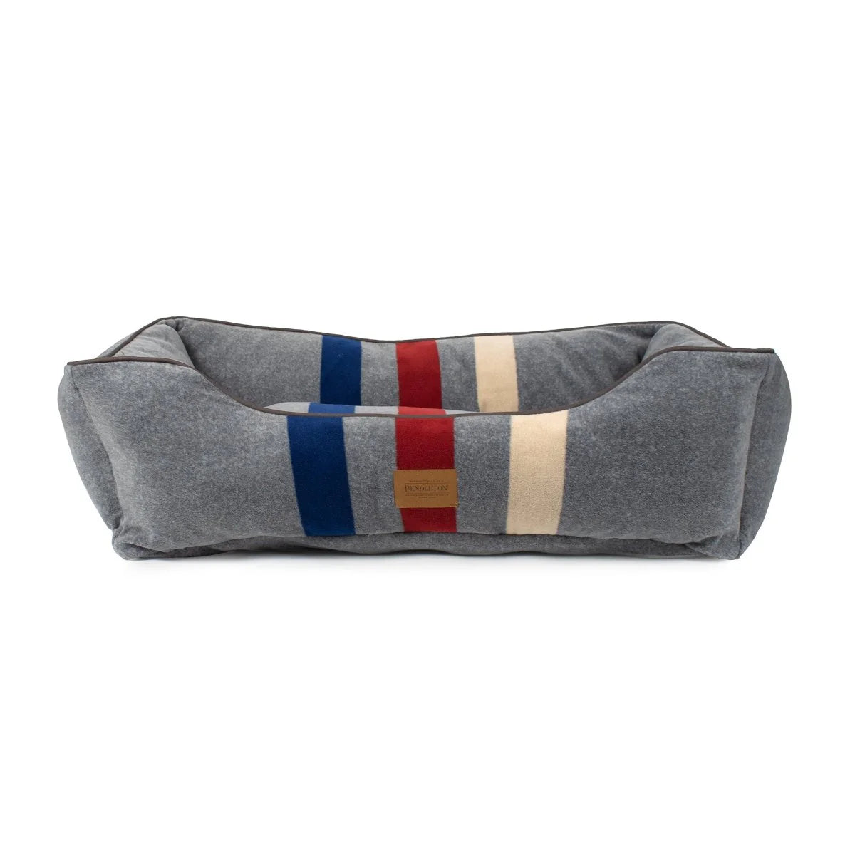 Gray pet bed with colorful striped pattern on a white background