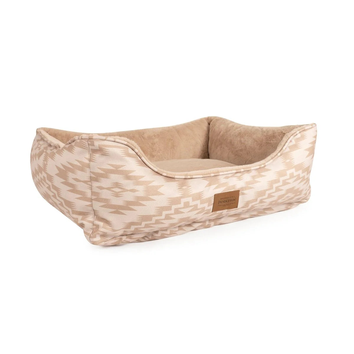 Beige pet bed with a brand label on a white background