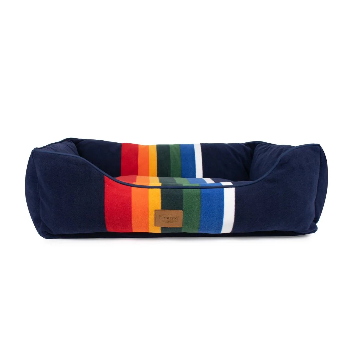 Navy pet bed with colorful striped pattern on a white background