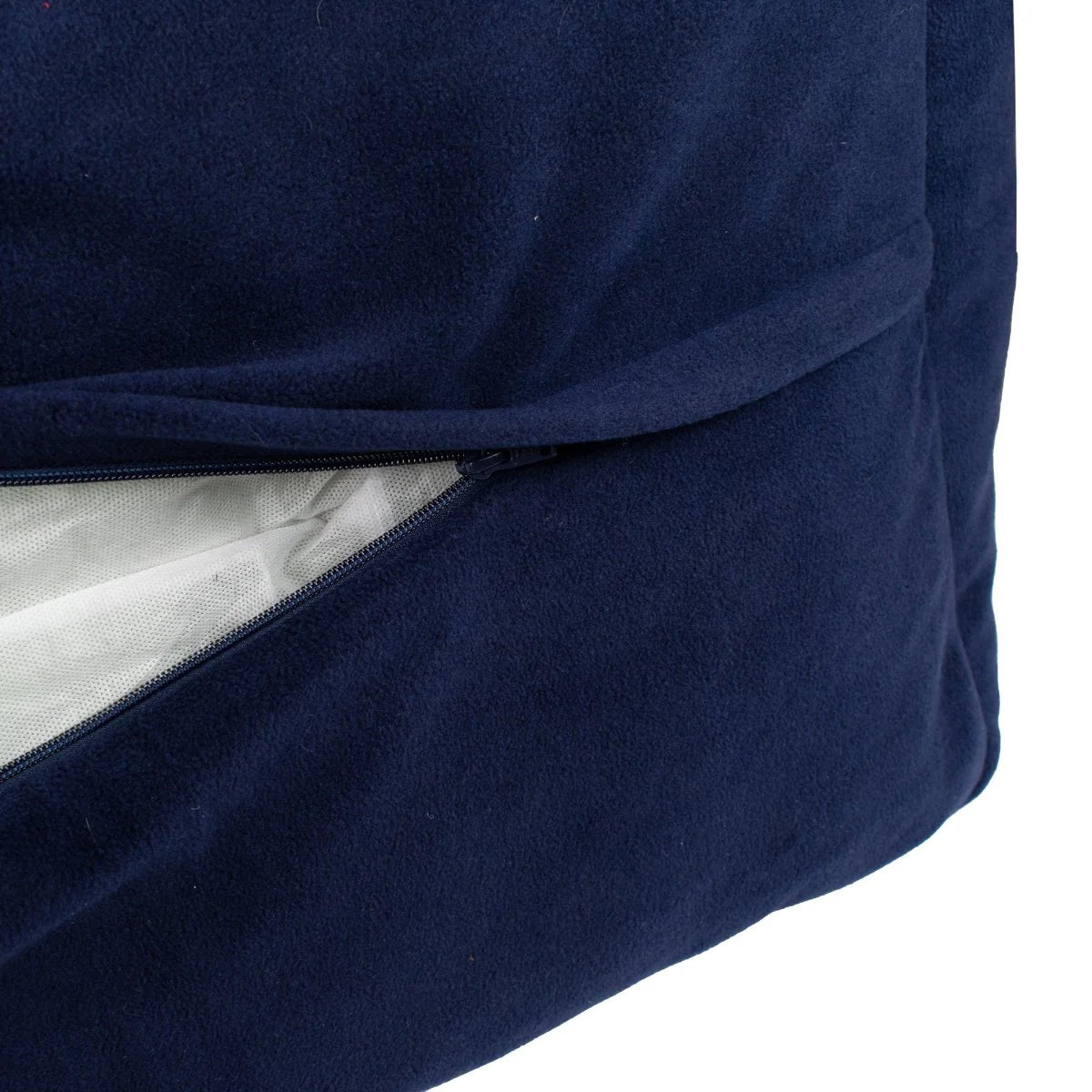 Close-up of a navy blue fabric with a white interior lining on a white background