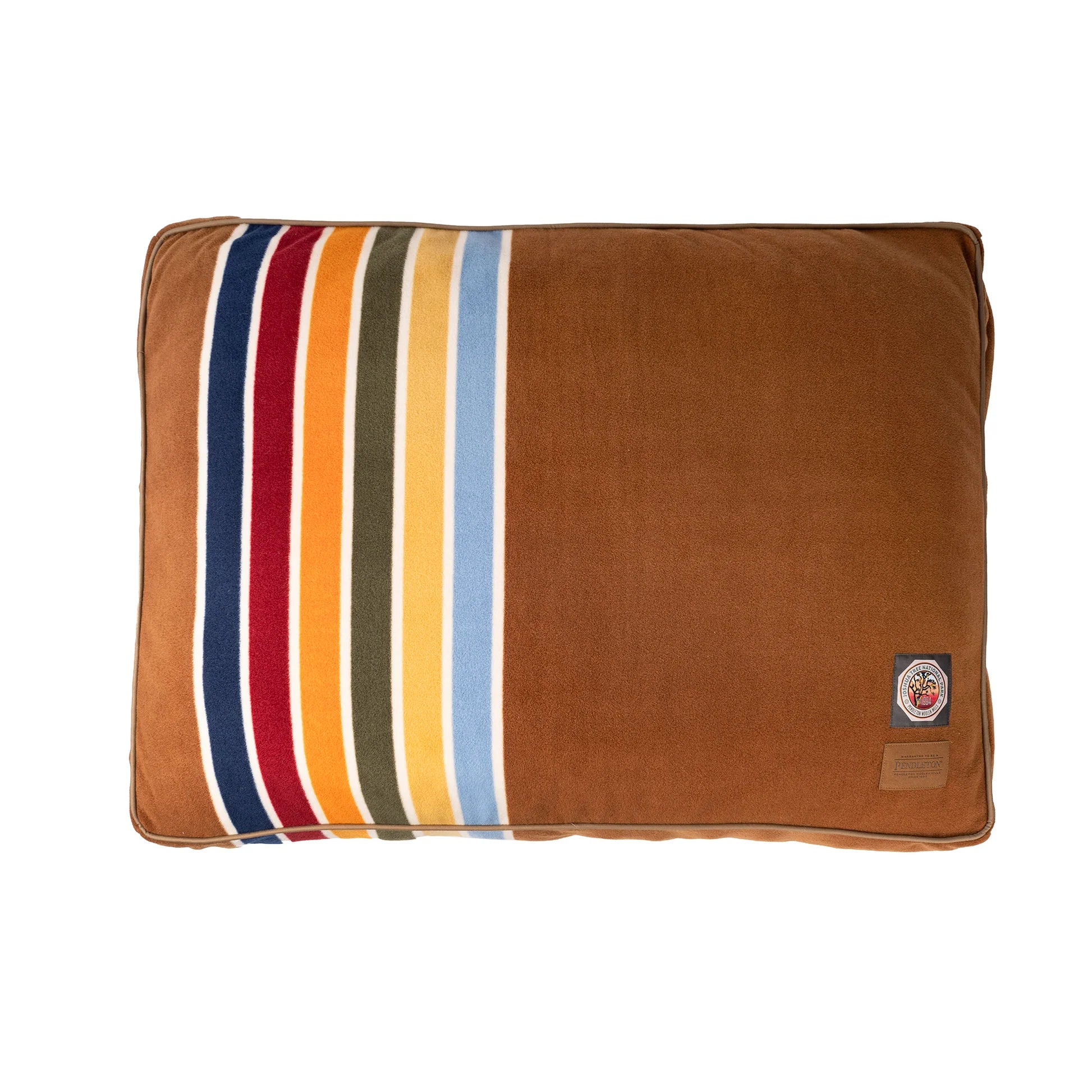 Brown pet bed with colorful striped pattern on a white background