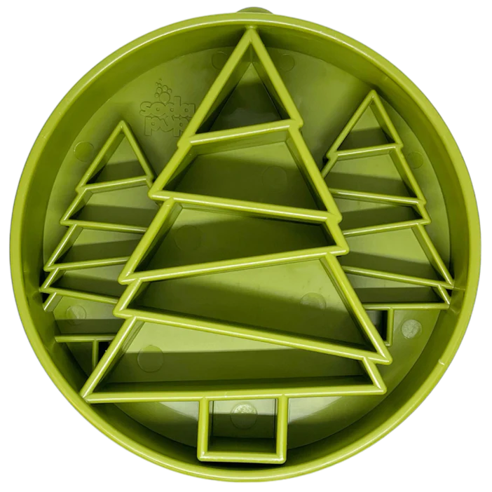 Green plastic shape sorter toy with geometric shapes on a white background