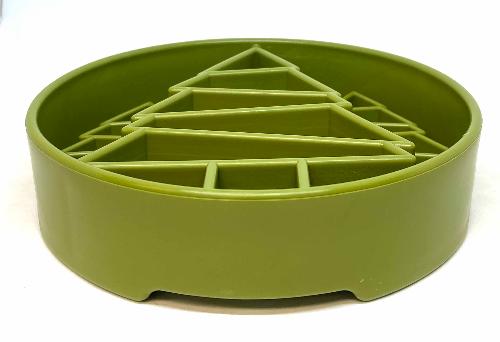 Green plastic feeder with geometric design on a white background