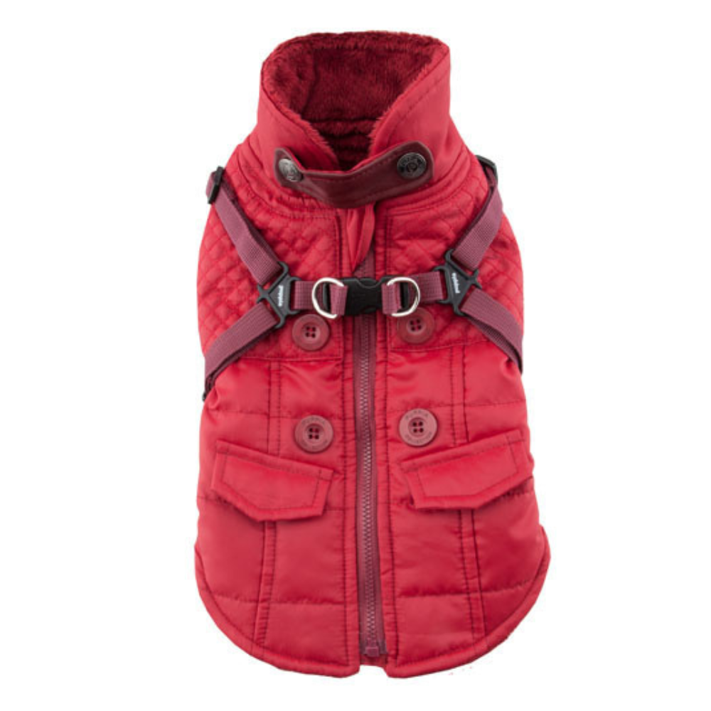 Red puffer vest with harness on a white background